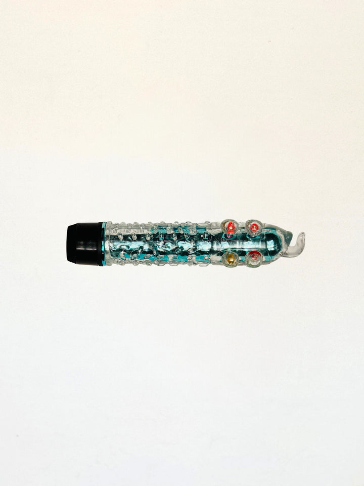 Vibrador con funda de gel texturizada