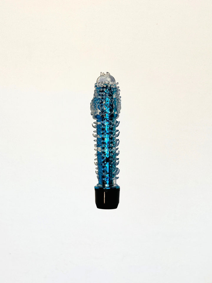 Vibrador con funda de gel texturizada I